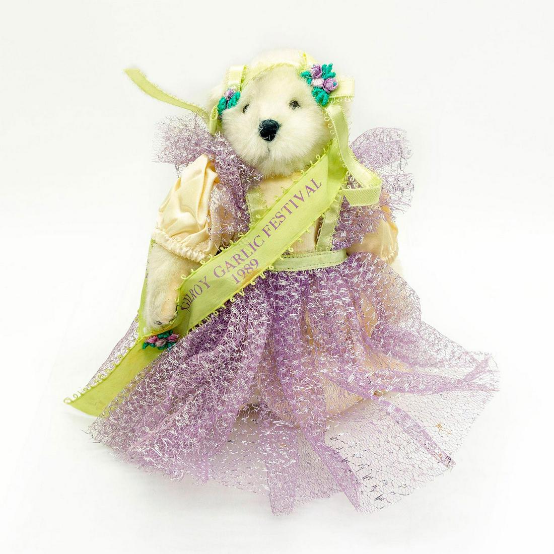 North American Bear Teddy Bear, Gilroy Garlic Princess: White mohair, stitched nose, fully jointed. Sash reads "Gilroy Garlic Festival 1989". Original tag attached. Comes with stand. Good condition. Minor staining throughout. #teddybear #plush #princess #v