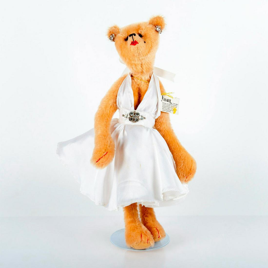 Vintage Hugable Bears Teddy Bear, Marilyn Monroe: Collectible hand made articulated bear; dressed in white dress; adorned with accessories. Includes stand. Issued: 20th c. Dimensions: 16.75"H Manufacturer: Hugable Bears