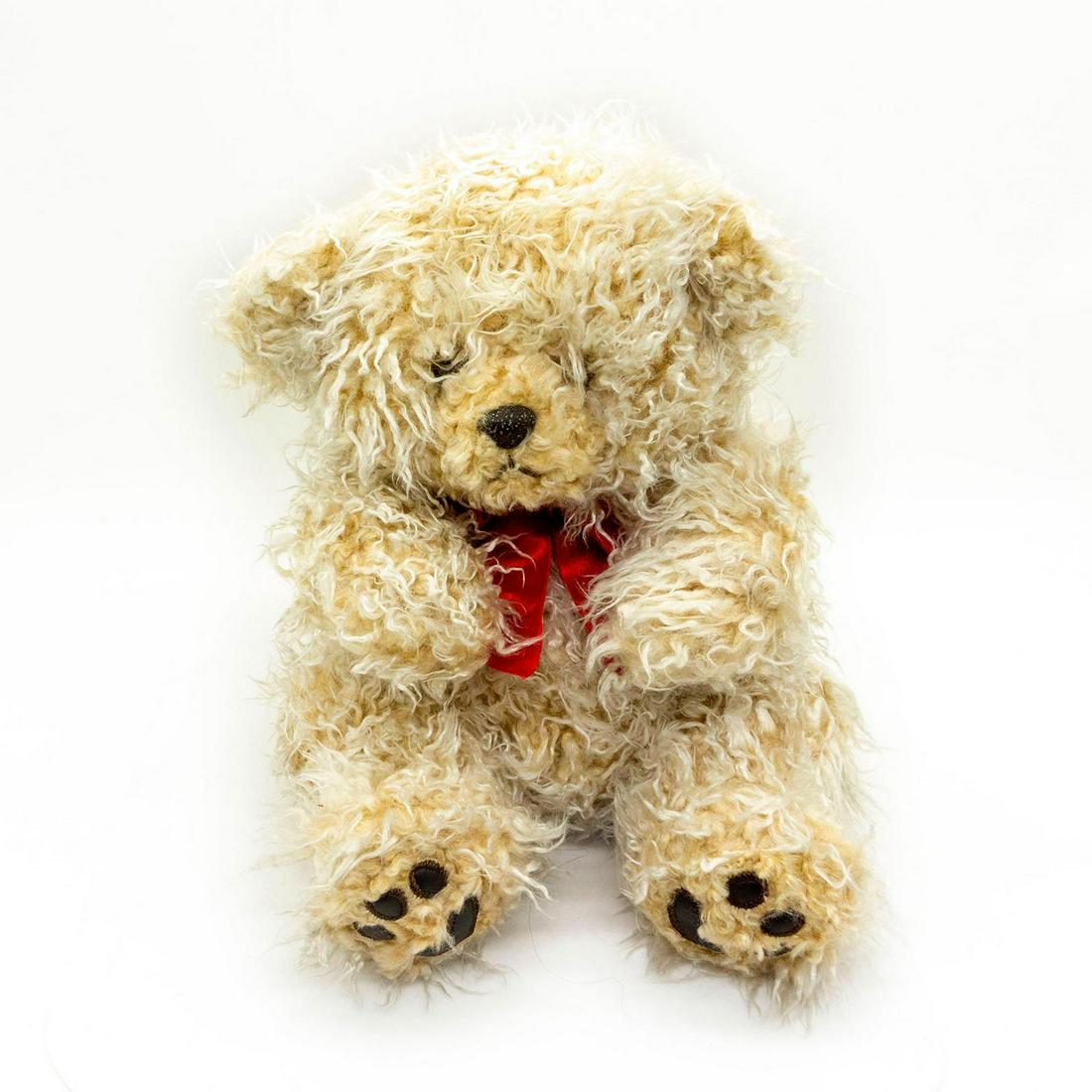 Vintage Playful Pals Teddy Bear: Non-articulated, blonde plush, with big red bow. Good Issued: 20th c. Dimensions: 11"H Manufacturer: Playful Pals