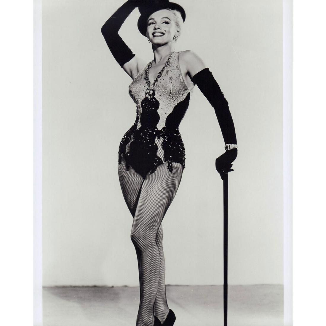 Marilyn Monroe Photograph: Photo still of Marilyn Monroe wearing a dance costume from the 1953 film Gentlemen Prefer Blondes. #marilynmonroe #gentlemenpreferblondes Issued: 1953 Dimensions: 8"W x 10"H Country of Origin: USA