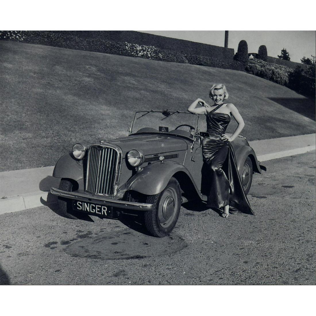 Marilyn Monroe Photograph: Photo of Marilyn Monroe leaning on a Singer SM1500 Roadster car, photographed by Frank Worth on the set of How to Marry a Millionaire in 1953. Printed on Fujicolor Crystal Archive paper. #marilynmonro