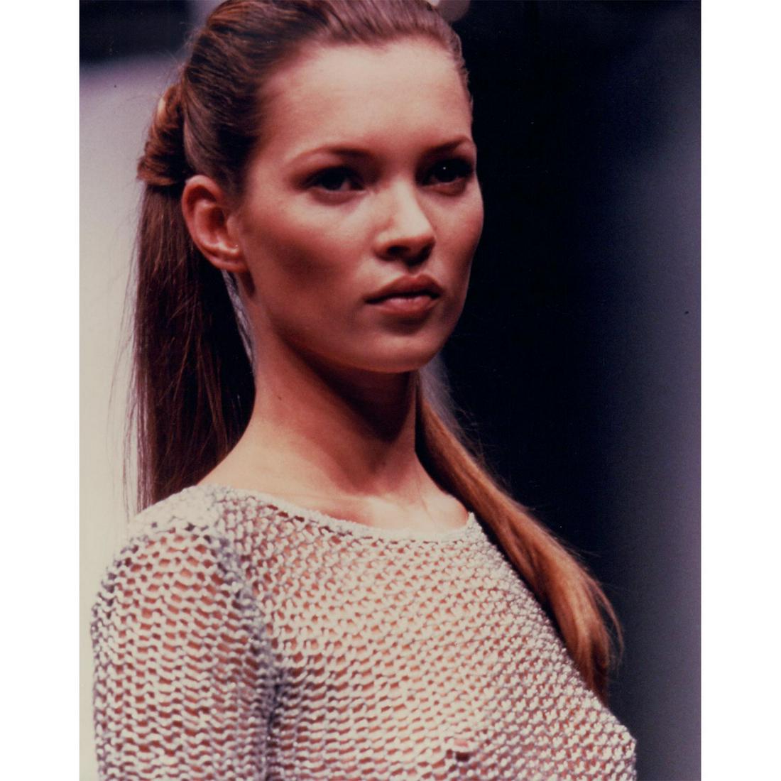 Kate Moss Photograph: Partial nude portrait photo of English supermodel Kate Moss wearing a light open knit sweater. Printed on Kodak Professional paper. #katemoss #supermodel Issued: c. 1990 Dimensions: 8"W x 10"H