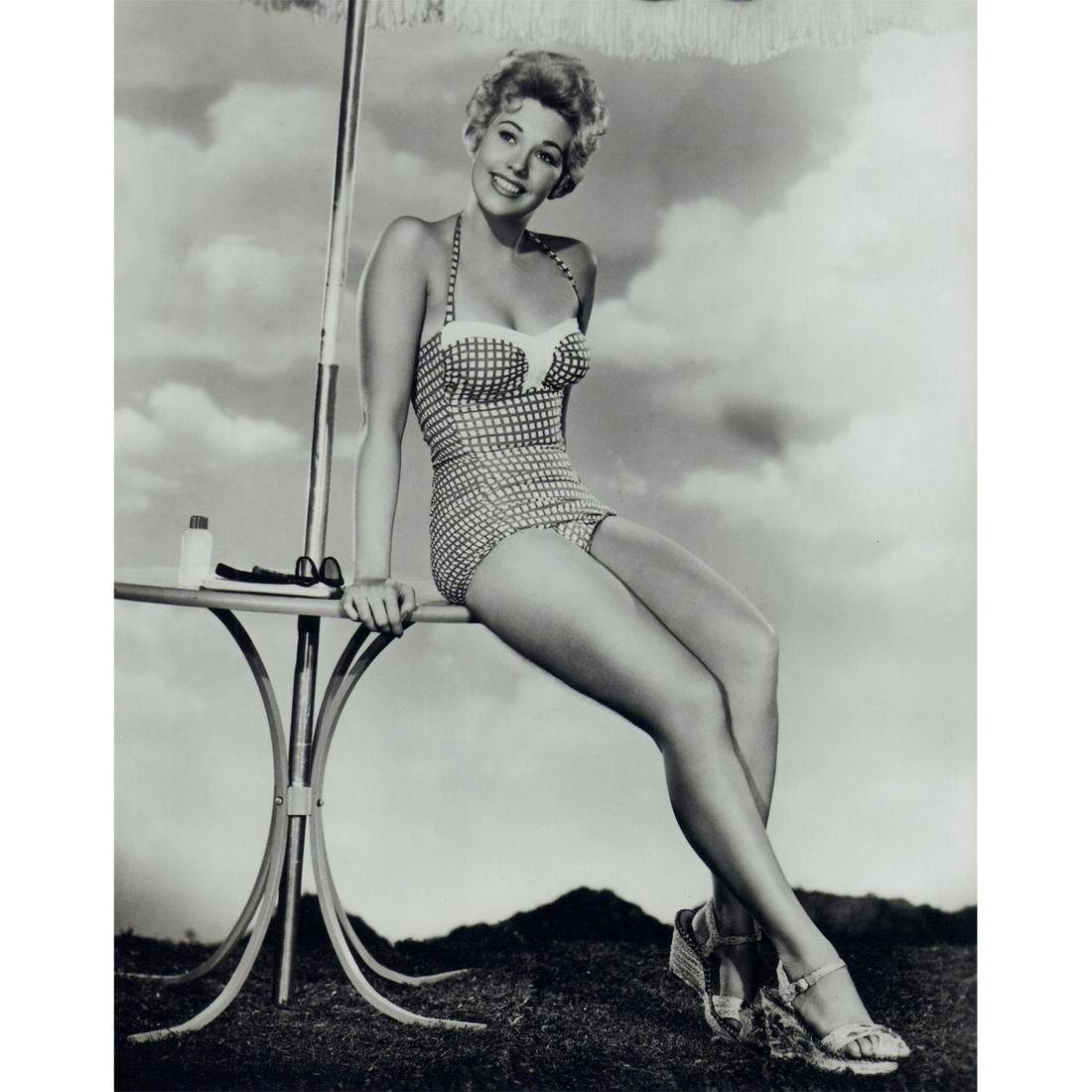 Kim Novak Photograph: Black and white photo of actress Kim Novak wearing a checkered swimsuit. Printed on Fujicolor Professional paper. #kimnovak #oldhollywood Issued: c. 1950 Dimensions: 8"W x 10"H Country of Origin: USA