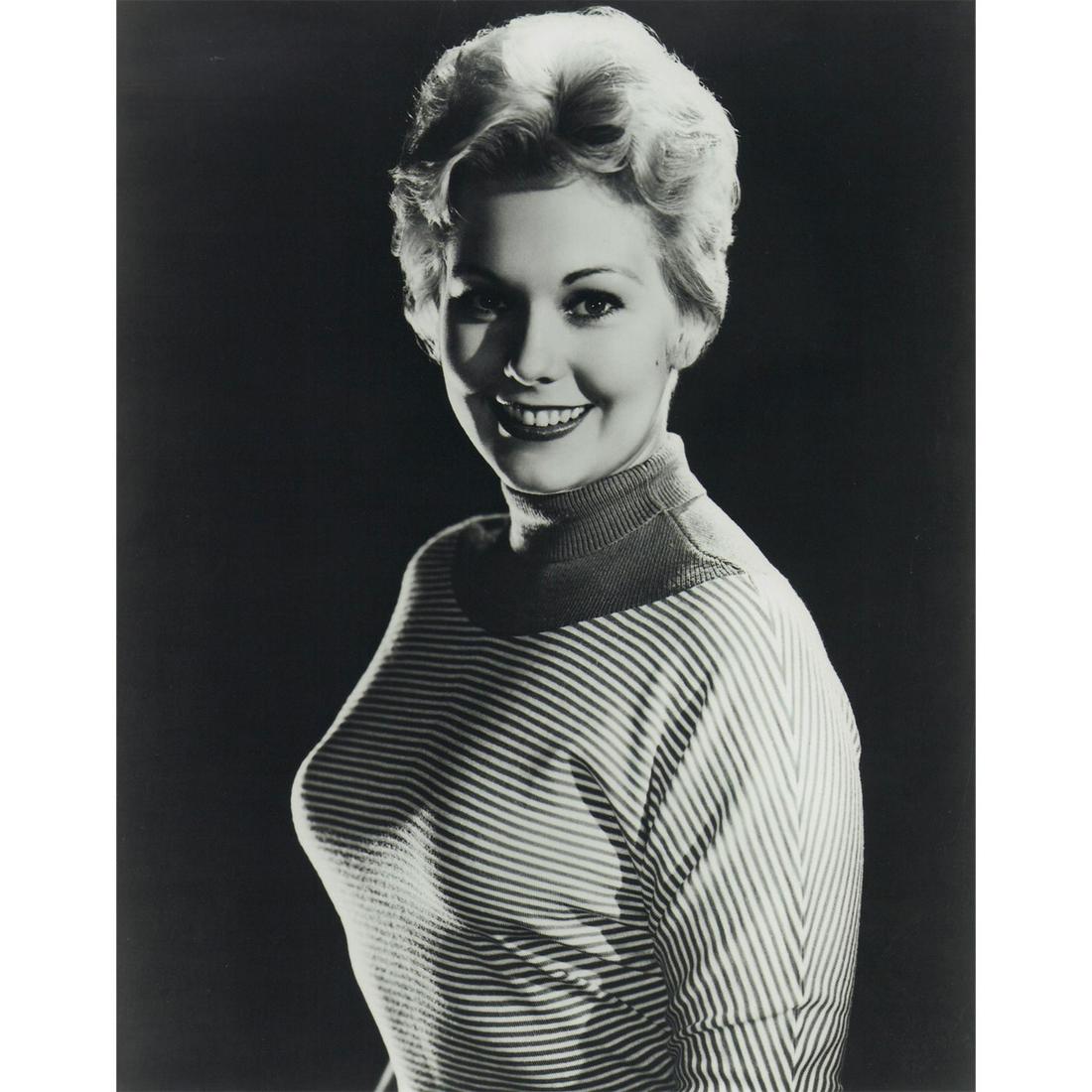 Kim Novak Photograph: Black and white portrait photo of actress Kim Novak wearing a striped sweater. Printed on Fujicolor Professional paper. #kimnovak #1950s #oldhollywood Issued: c. 1955 Dimensions: 8"W x 10"H Country of