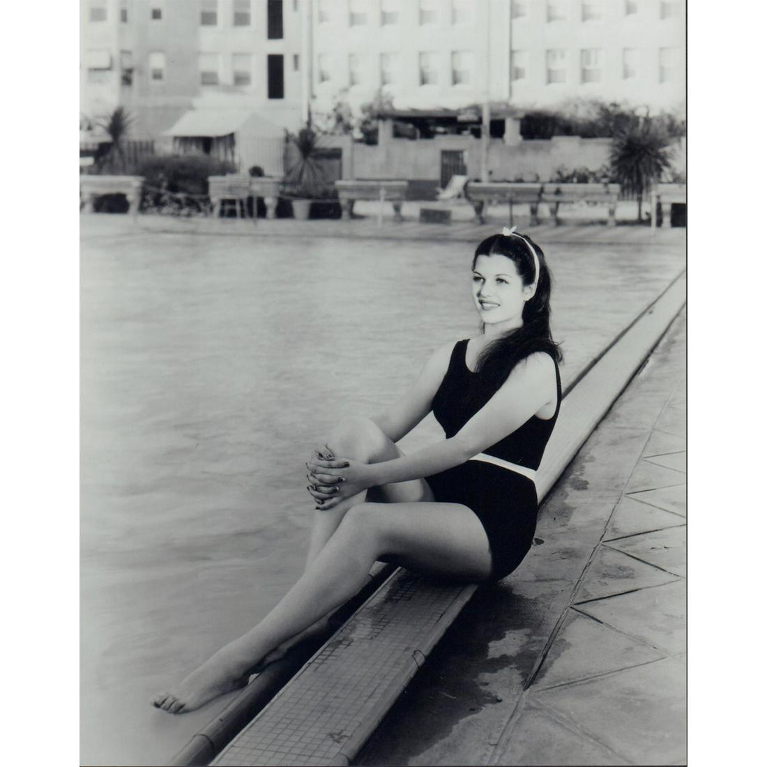 Rita Hayworth Photograph: Photo of Rita Hayworth wearing a swimsuit by a pool in 1935. Printed on Fujicolor Professional paper. #ritahayworth #ritacansino #lovegoddess #oldhollywood Issued: 1935 Dimensions: 8"W x 10"H Country 