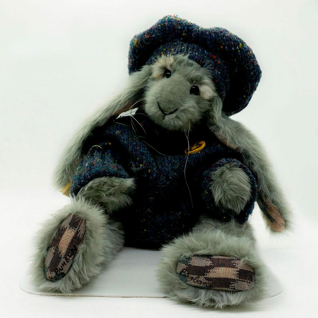Barbara's Originals Limited Edition Stuffed Rabbit, Bun: Filled with polyester and polypropylene pellets. Wears a dark blue wool sweater and matching cap. Limited edition number 9. Honey Cups collection. Manufacturer tag attached. Fully jointed. Artist sign