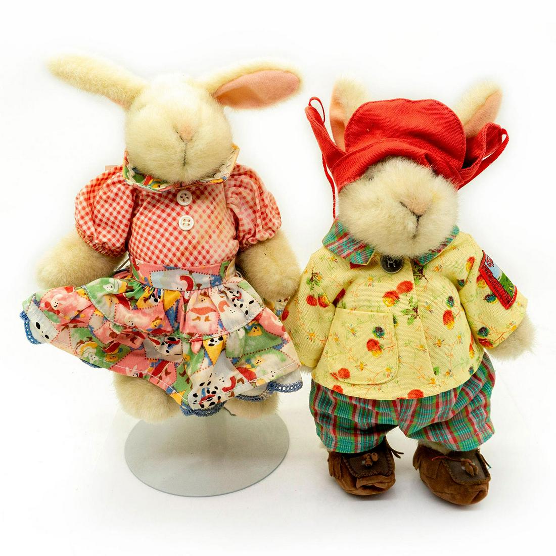 2 North American Plush Rabbits, Hiker And Square Dancer: Yellow floral jacket and red cap on Hiker. Pink plaid dress with white buttons on Square Dancer. Hoppy VanderHare collection. Jointed limbs. Original tags attached. Age related wear. #plush #rabbit #b