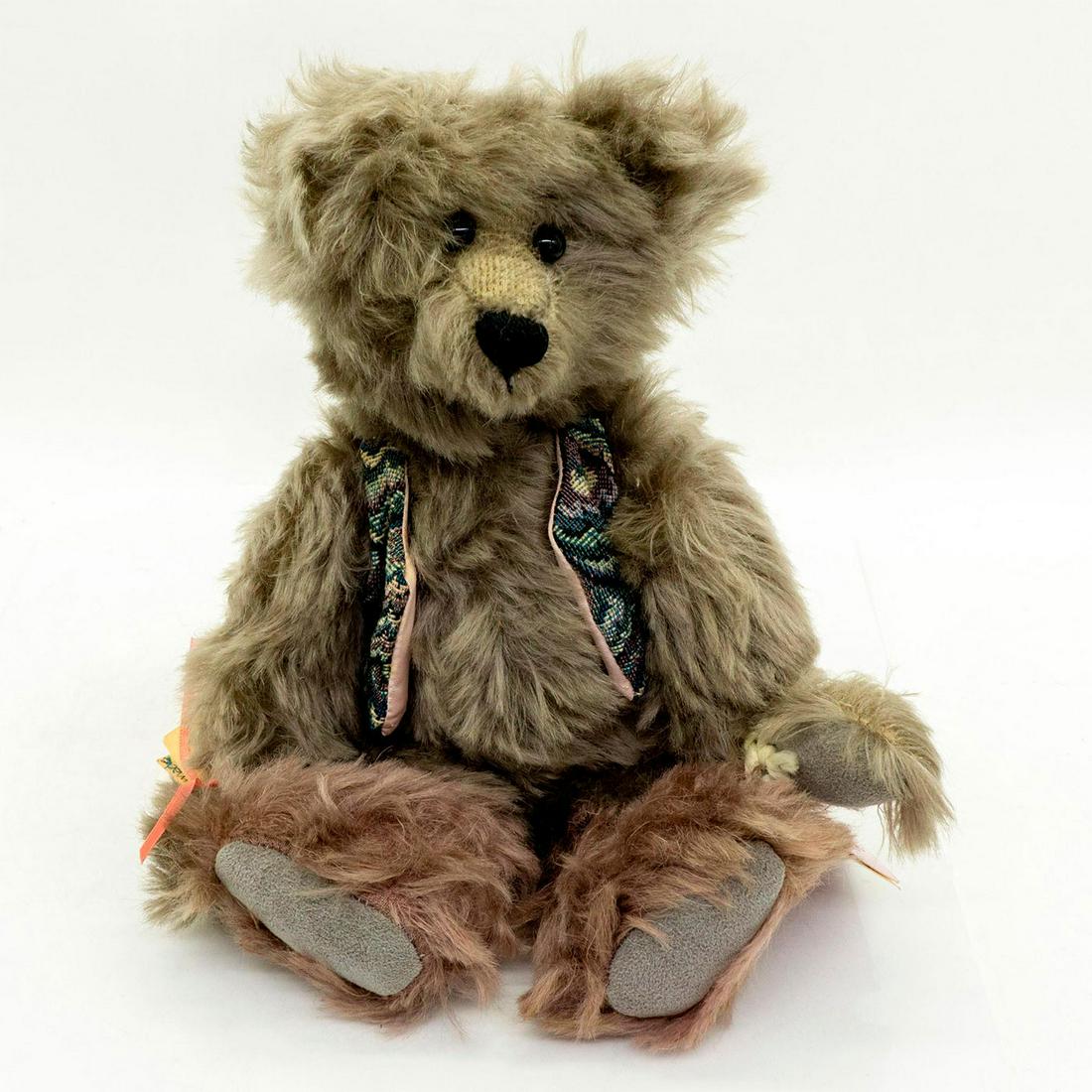 The Bear Cellar, Julio Grey Teddy Bear: Limited edition 21 of 25. Hand-crafted collectible teddy bear was created with 100% imported mohair, suede paws and glass eyes. Julio's feet are purple from stomping grapes. Shows some natural aging b