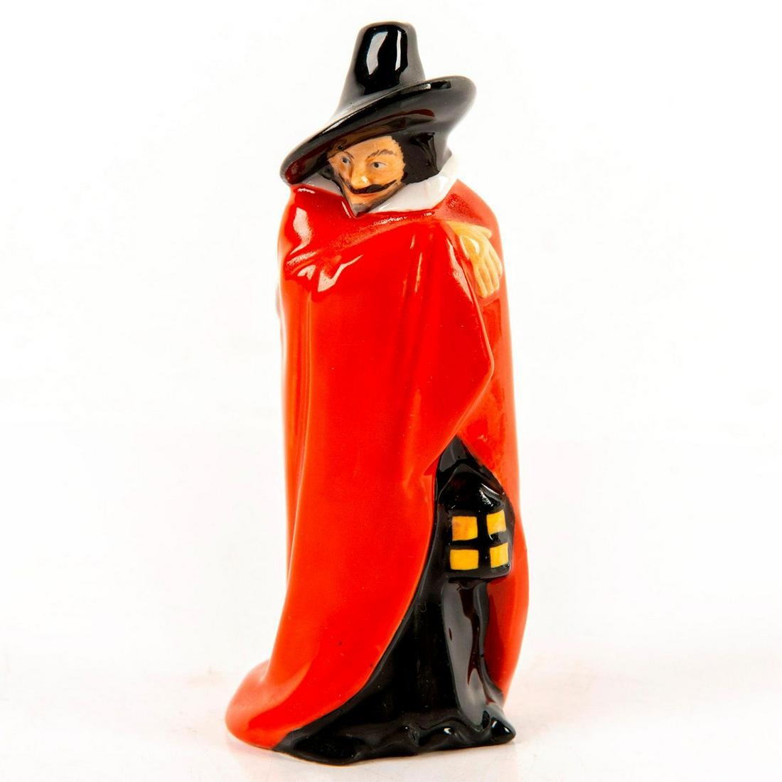 Guy Fawkes - Royal Doulton Mini Figurine: Miniature series. Red and black coloration. Doulton backstamp. Artist: Charles Noke Issued: 1989-1991 Dimensions: 4"H Manufacturer: Royal Doulton Country of Origin: England