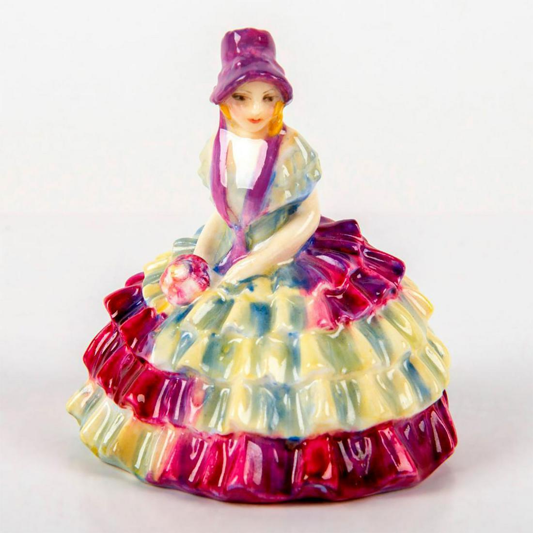 Chloe M29 - Royal Doulton Figurine: Miniature woman in large, layered, pink and creme dress. Royal Doulton backstamp. #Doultonlady Issued: 20th c. Dimensions: 3"H Manufacturer: Royal Doulton Country of Origin: England