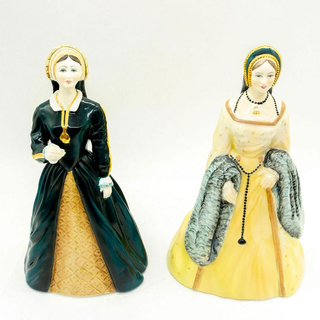 2pc Coalport Figurines, Katheryn Howard and Anne Boleyn: The Royal Collection. The six wives of Henry VIII series. Beautiful bone china figurines with gold accents. Good condition. Coalport backstamp. Do not come with boxes. Artist: Robert Worthington Issue
