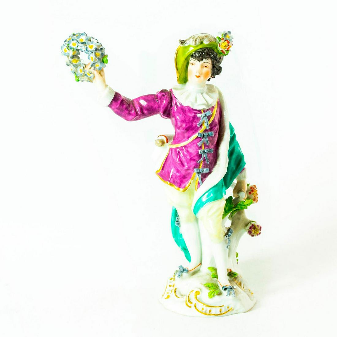 Vintage Porcelain Figurine, Standing Gentleman: German style porcelain figure; hand painted. Applied flowers; gilt accents. Chipped petals; broken staff. Issued: 20th c. Dimensions: 5.75"H