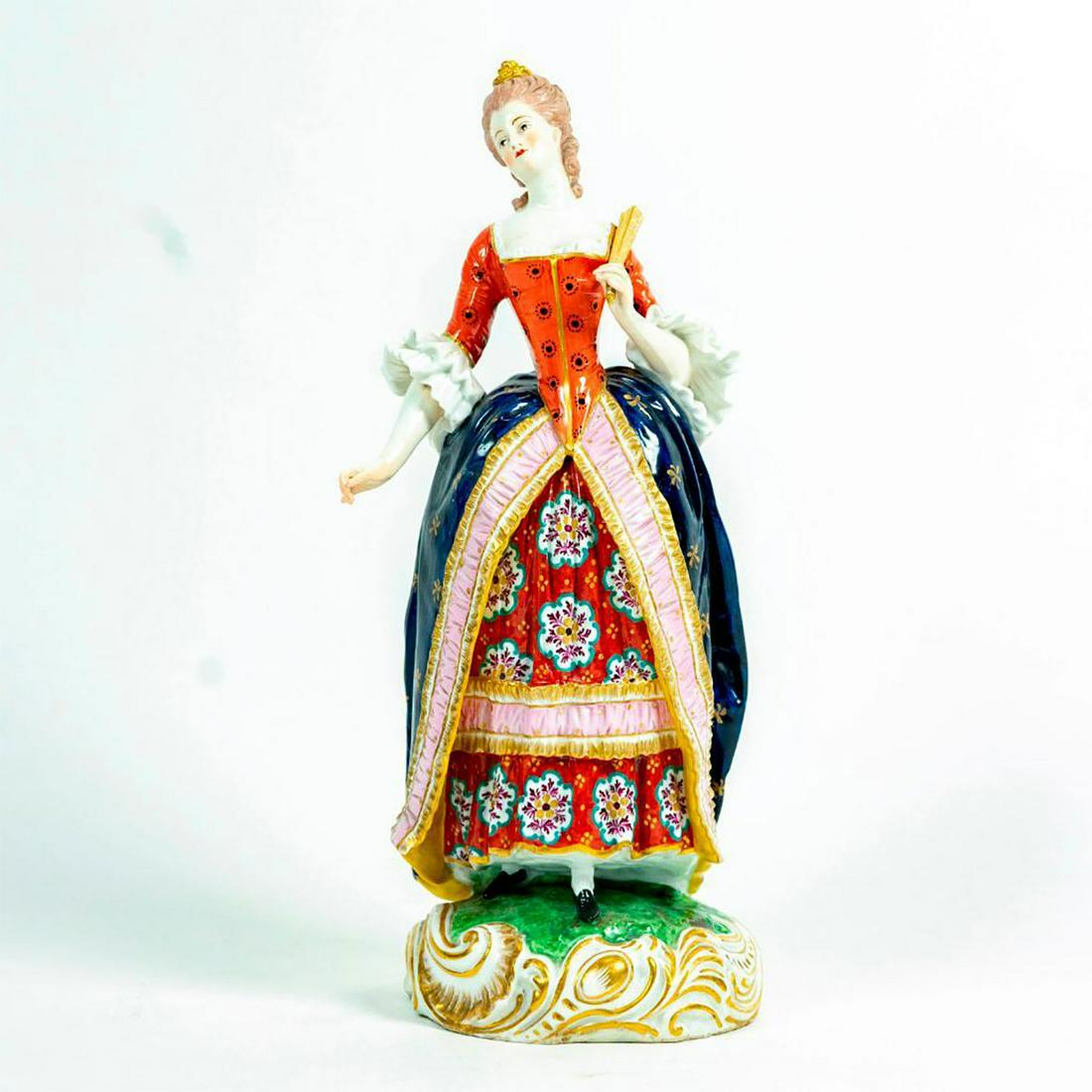 Vintage Porcelain Figurine, Victorian Lady: Beautifully hand painted, on a rococo style base depicting a Victorian lady in a colorful dress with a hand fan. Red factory mark to backside of base. Issued: 20th c. Dimensions: 13"H