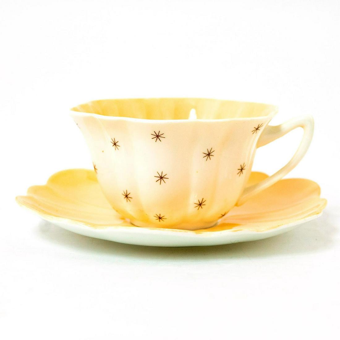 Shelley Fine Bone China Cup And Saucer, Pole Star, Blue: Best Ware collection; Pole Star, pattern 13774. White glazed finished w. pale peach interior. Shelley backstamp. Marked Pole Star on the underside. Issued: 20th c. Dimensions: 5.5"W x 3"H Manufacturer