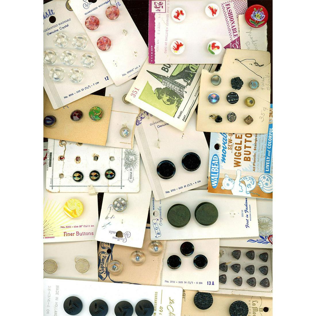 A LARGE BAG LOT OF BUTTONS ON ORIGINAL CARDS (1 of 2)
