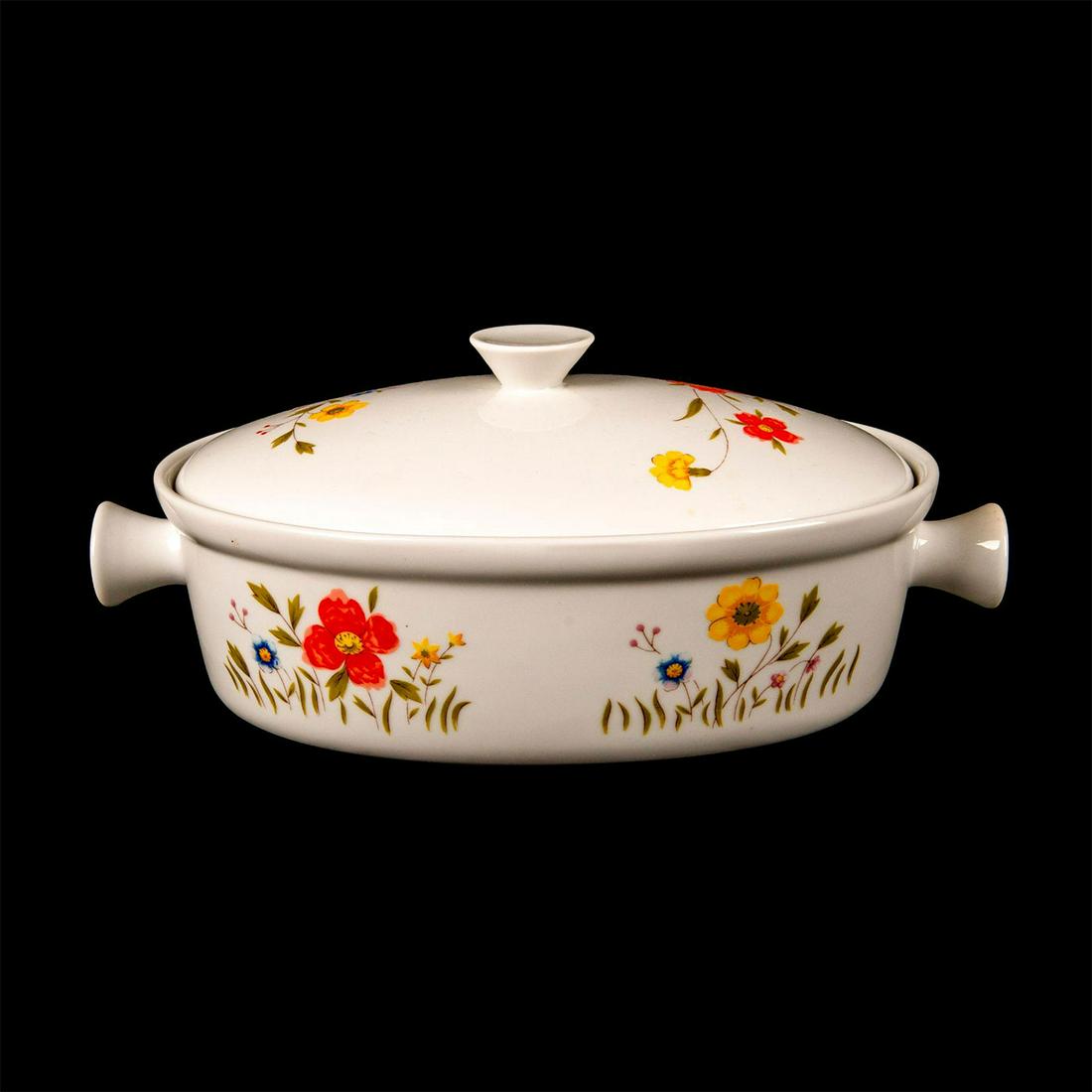 Andrea By Sadek Country Flowers Porcelain Casserole: Country style flowers and dish in yellow red, blue with green. Two stem handles on either side and lid. Andrea backstamp. 9228 stamped on the bottom. Issued: 20th c. Dimensions: 12"L x 6.5"W x 3.5"H M