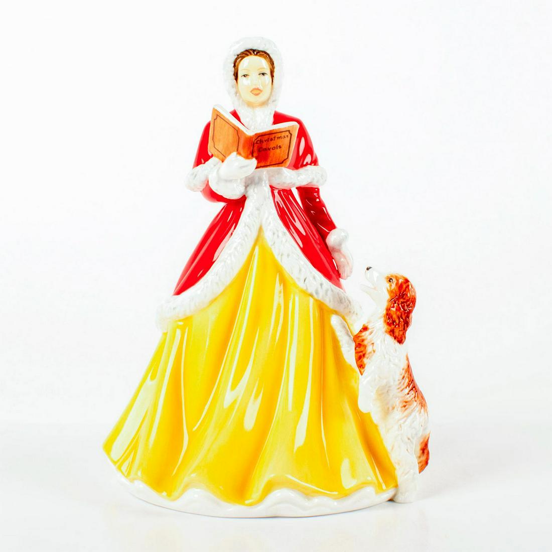 Angels From The Realms of Glory HN5889 - Royal Doulton: Bone China. Victorian carol singer wearing yellow skirt and red coat, with her loyal Border Collie at her side. Carol Singing has been synonymous with Christmas celebrations for centuries and the Roya