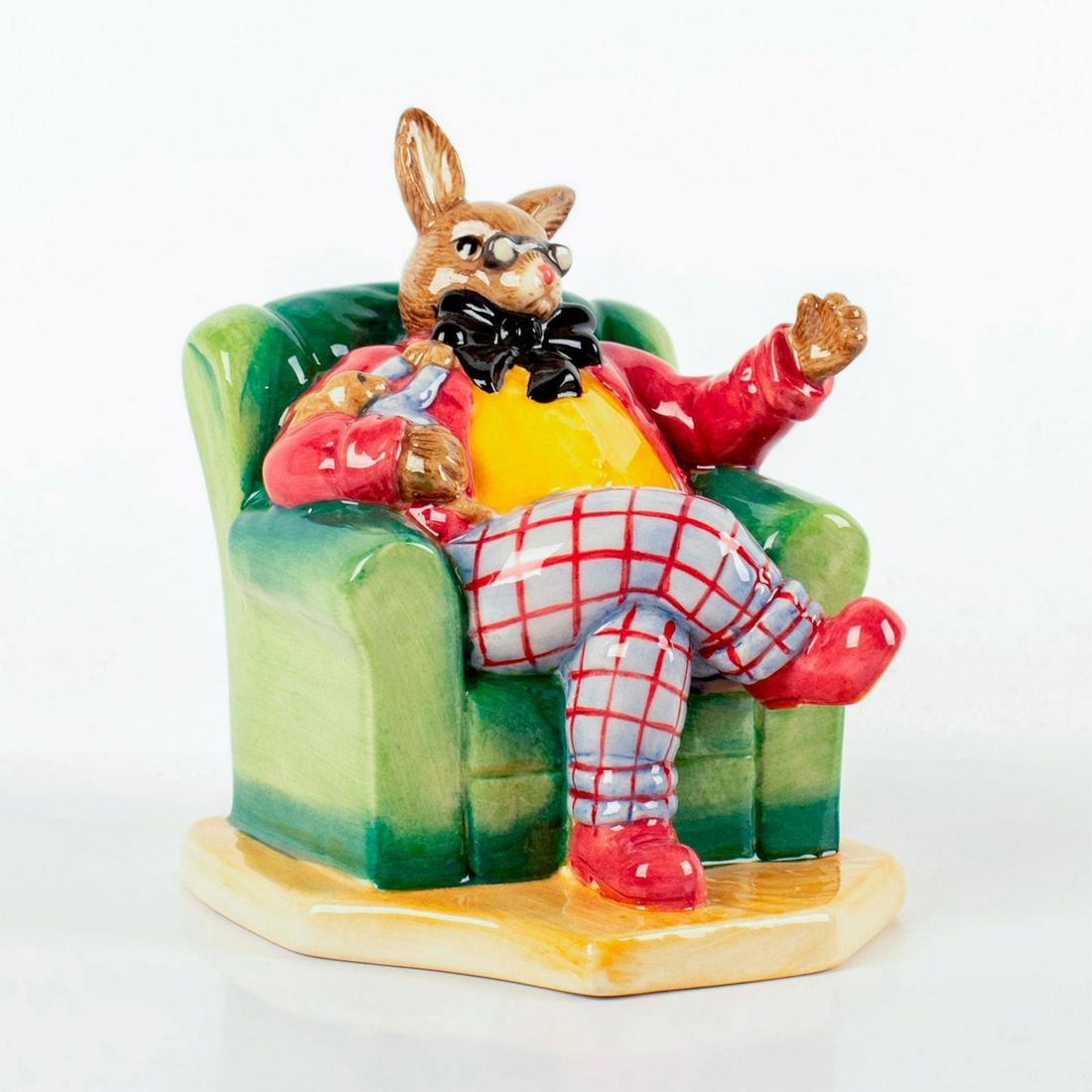Once Upon a Time DB441 - Royal Doulton Bunnykins: Brown bunny wearing red, yellow, and blue outfit, sitting on a cozy green chair. 2008 RDICC Bunnykins Membership Gift. Bunnykins backstamp. Original box and certificate included. #royaldoulton #bunnyk