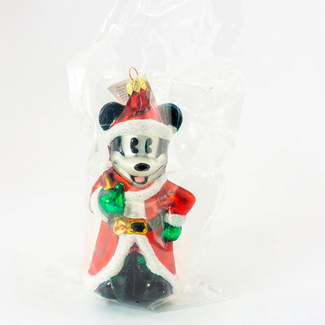 Christopher Radko Christmas Ornament, Christmas Eve: Produced exclusively for A Disney Catalog. Colorful hand-painted glass ornament of Mickey Mouse in Santa Claus costume. Comes with original box. Includes original tag. Comes in original plastic packin