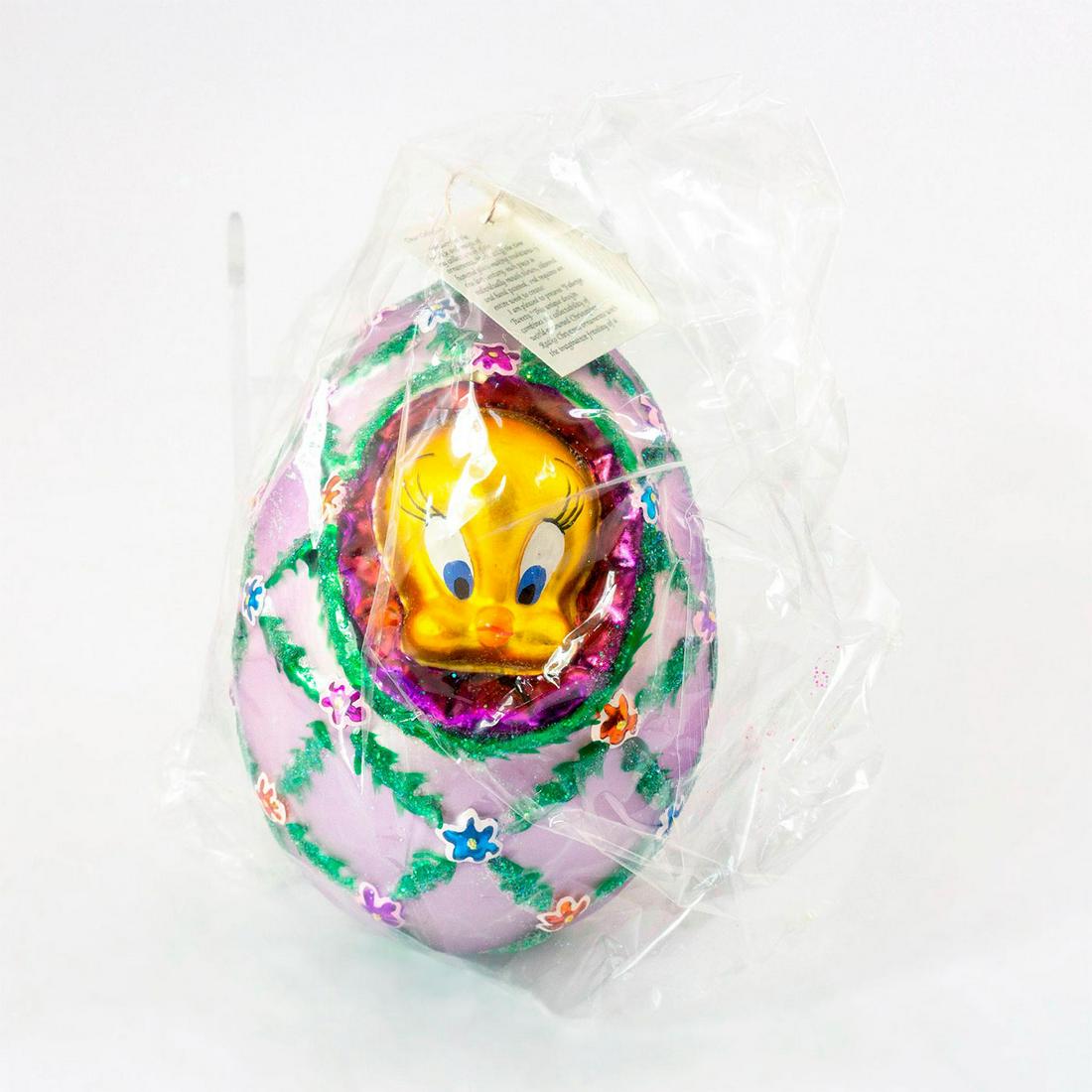 Christopher Radko Christmas Ornament, Faberge Tweety: Limited edition of 1323 of 5000. Colorful hand-painted egg shaped glass ornament of Warner Bros. Looney Tunes Tweety bird. Glitter accent. Comes with original box. Includes original tag. Sealed in a p