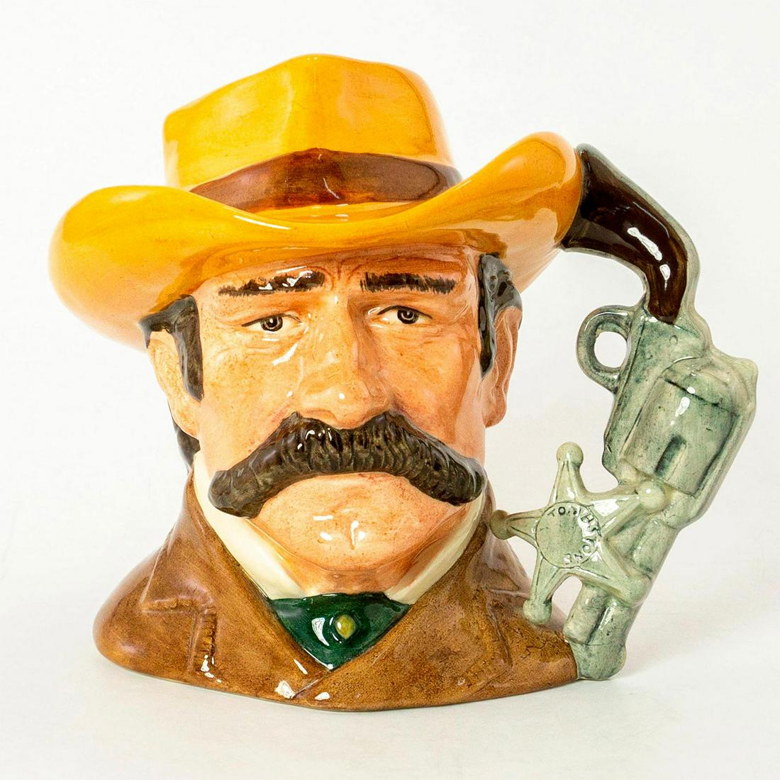 Wyatt Earp D6711 - Odd Size - Royal Doulton Character: Series: The Wild West Collection, issued 1985 - 1989. Brown coat; light brown hat with brown band. Doulton backstamp. Royal Doulton Character Jug, Wyatt Earp D6711. Wyatt Berry Stapp Earp (1848 - 1929