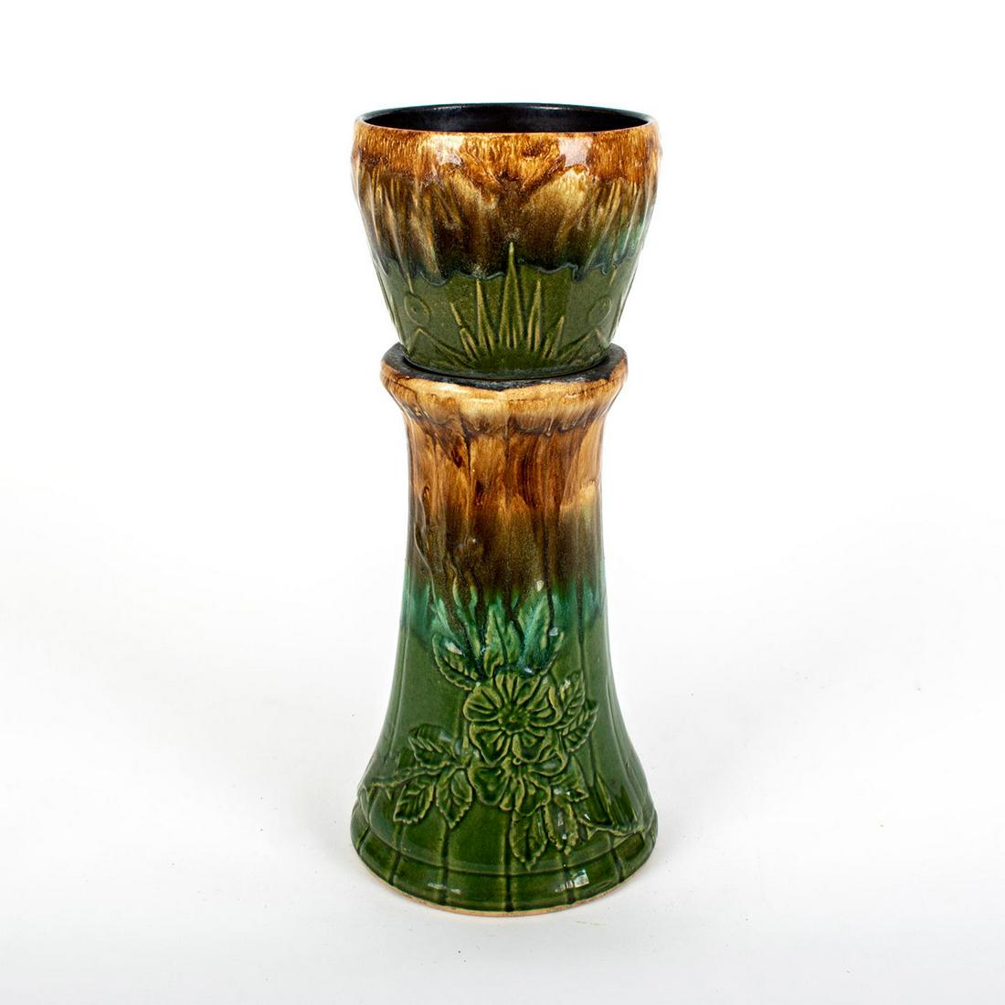 McCoy Style Jardiniere with Pedestal Stand: Designed in high relief in beautiful colorations of rich green and brown glazes . Classic stylized stand with floral designs. Jardiniere 6"H x 7"D, Stand 13.5"H.