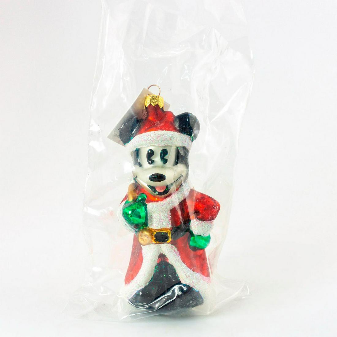 Christopher Radko Christmas Ornament, Christmas Eve: Produced exclusively for A Disney Catalog. Colorful hand-painted glass ornament of Mickey Mouse in Santa Claus costume. Comes with original box. Includes original tag. Comes in original plastic packin