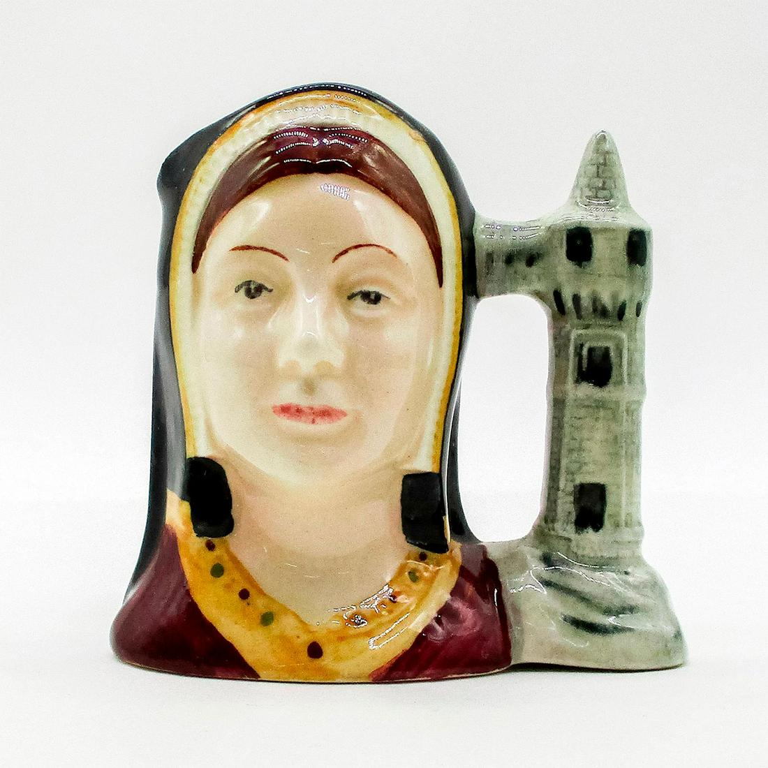 Catherine Aragon D6658 - Mini - Royal Doulton Character: Style One. Red, gold, black, and white coloration. In a political arrangement between two countries, the daughter of Ferdinand and Isabella of Spain, Catherine (1485 - 1536) was married to Arthur, Pri