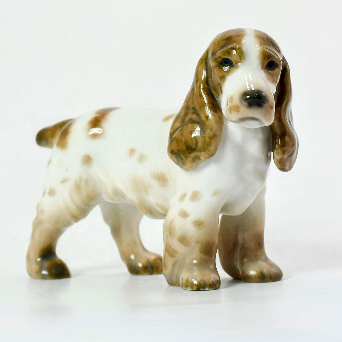B&G Bing and Grondahl Figurine, Cocker Spaniel 2172: Glossy porcelain Cocker Spaniel dog with dark brown and white coloration. Bing and Grondahl backstamp. #BingandGrondahl #porcelain #figurine #cockerspaniel Issued: 1915 - 1948 Dimensions: 4.5"L x 3.25