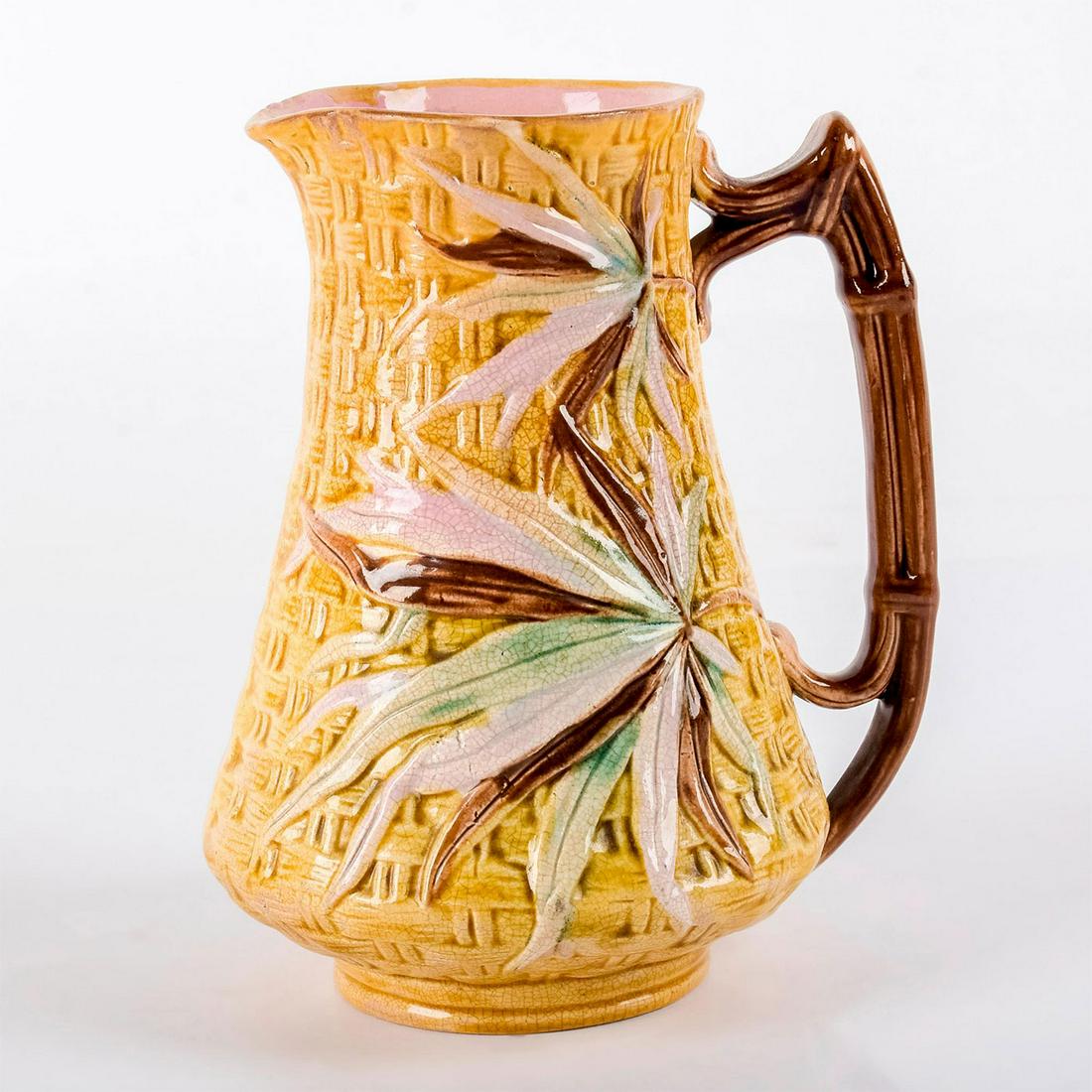 Antique Banks And Thorley Majolica Pitcher: Elegant bamboo and basket weave pattern. Yellow, brown, and green coloration. British Registry Mark on underside. Age related crazing throughout. #majolica #banksandthorley #pitcher Issued: 19th c. Di