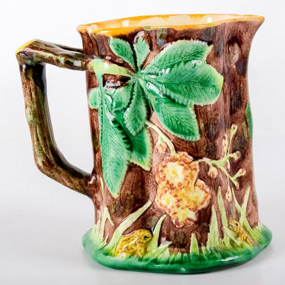 Antique Majolica George Jones Style Pitcher: Pleasing naturalistic design. In style of George Jones of Stoke-on-Trent. Brown and green coloration. Underside marked '10.' No manufacturer or artist markings. Age related wear. #majolica #pitcher #g