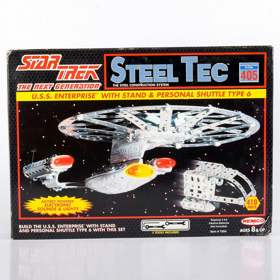 Steel Tec Star Trek U.S.S. Enterprise model w. Stand: 410 part Erector-set style model kit of Enterprise D and Type 6 Shuttle Sealed in box model set from a mid-90's toy line. Very cool Erector-set styled kit with tools and light up sounds and lights inc