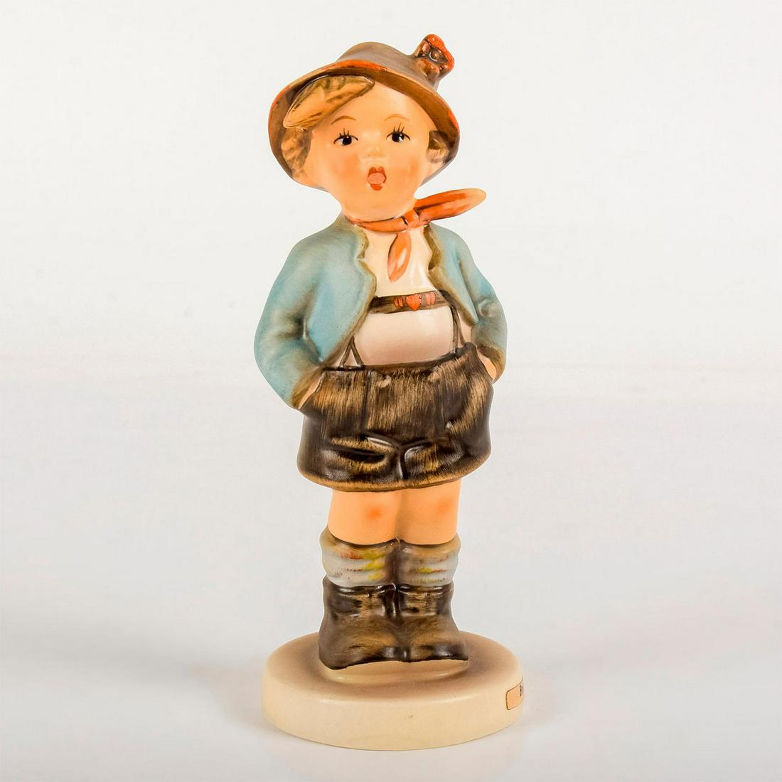Brother 95 - Goebel Hummel Figurine: Matte porcelain, hand painted. Young boy in blue coat with his hands in his pockets. 'M. I. Hummel' inscribed on base. Goebel backstamp. Good condition. #goebel #hummel #figurine Dimensions: 5