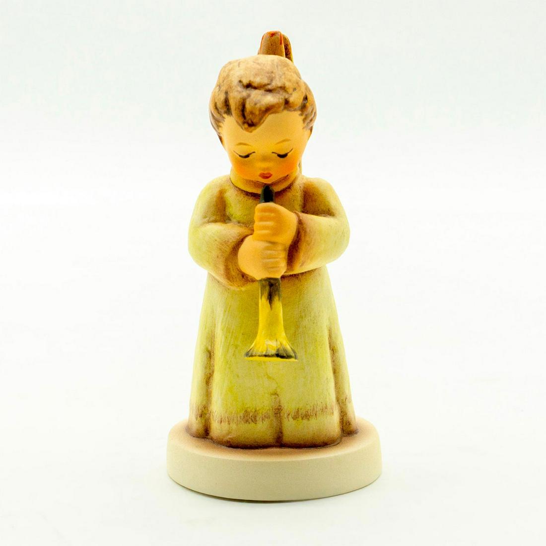 Echoes Of Joy 642 - Goebel Hummel Figurine: Variation 4. First issue. Matte porcelain, hand painted. Winged angel playing a horn. 'M. I. Hummel' inscribed on base. Goebel backstamp. Good condition. #goebel #hummel #figurine #vintage Dim