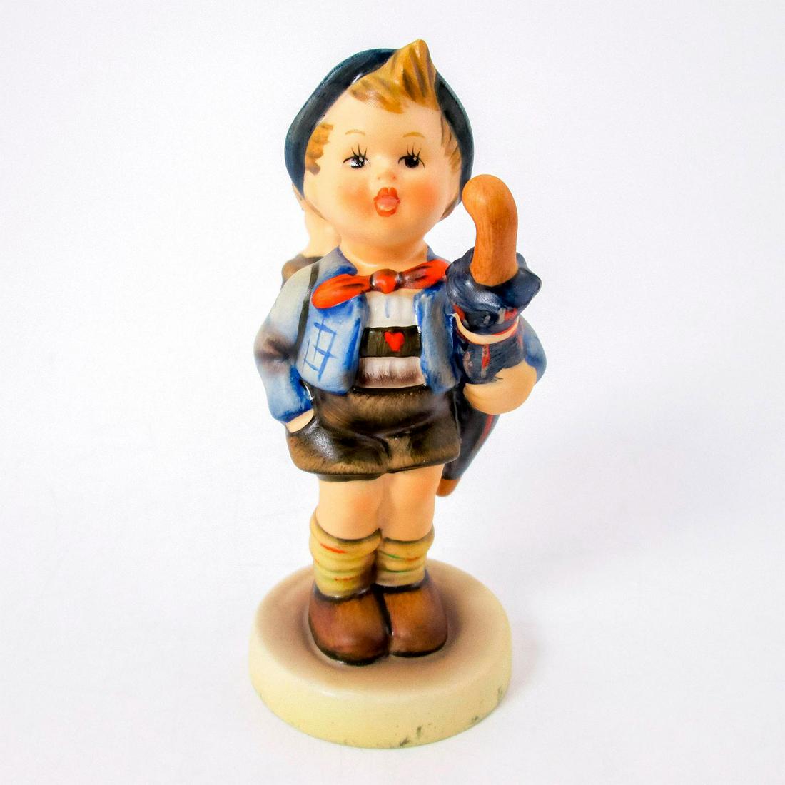 Home From Market 198 - Goebel Hummel Figurine: Variation 2. Matte porcelain, hand painted. Young boy carrying a pig in a basket. 'M. I. Hummel' inscribed on base. Goebel backstamp. Good condition. #goebel #hummel #figurine #vintage Dimensi