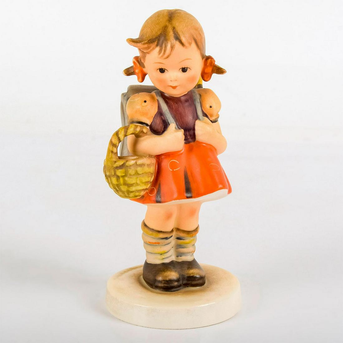 School Girl 81 - Goebel Hummel Figurine: Matte porcelain, hand painted. Confident girl wearing her school satchel and carrying a basket. 'M. I. Hummel' inscribed on base. Goebel backstamp. Age related wear. Weight: 4.5 oz #goebel #hu