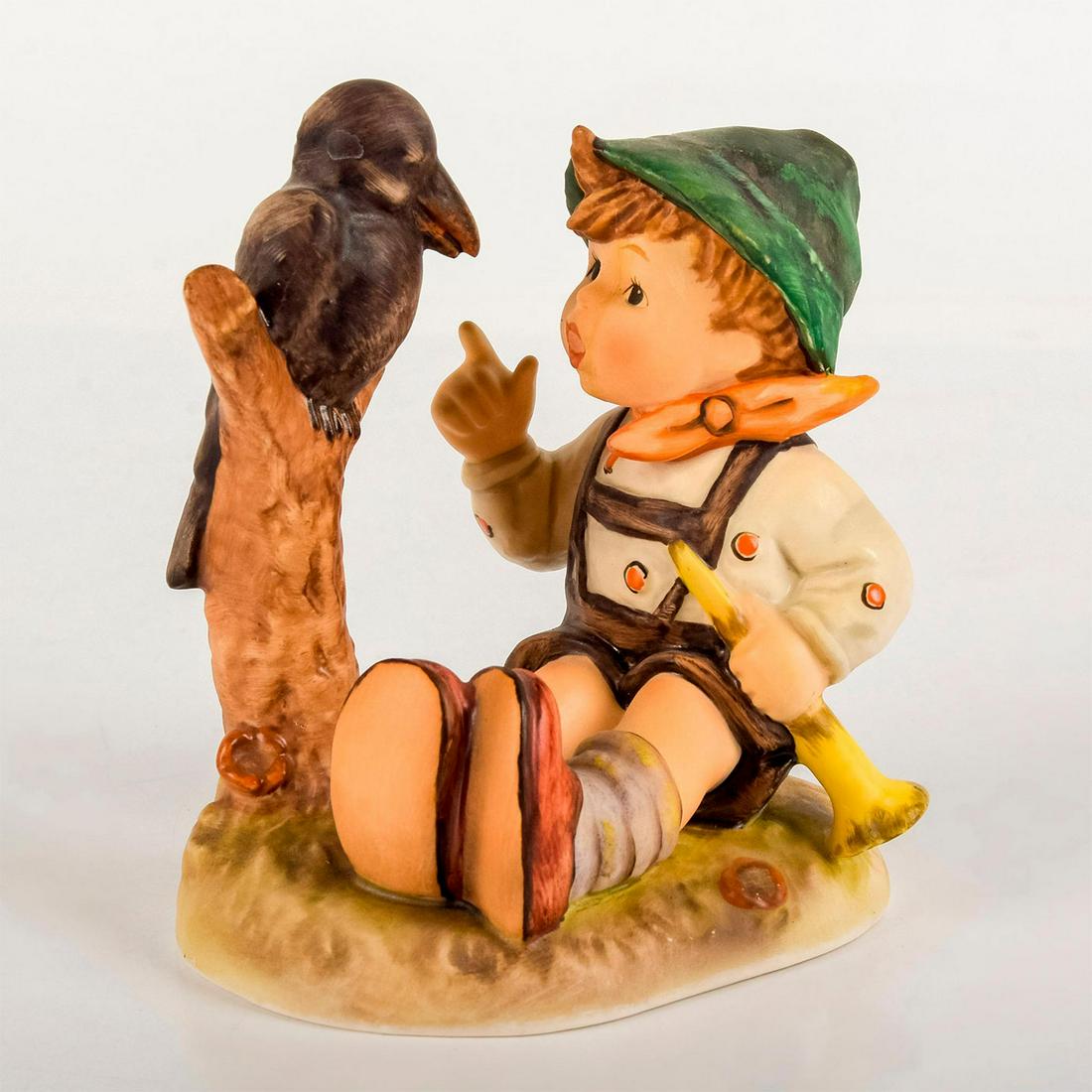 Sing Along 433 - Goebel Hummel Figurine: Matte porcelain, hand painted. Young boy with a golden horn singing to a bird. 'M. I. Hummel' inscribed on base. Goebel backstamp. Good condition. #goebel #hummel #figurine Dimensions: 4.5"H I