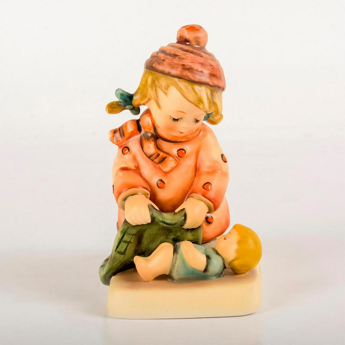 Sleep Tight 424 - Goebel Hummel Figurine: Matte porcelain, hand painted. Young girl with pigtails tucking in a sleeping baby. 'M. I. Hummel' inscribed on base. Goebel backstamp. Good condition. Weight: 7.5 oz #goebel #hummel #figurine