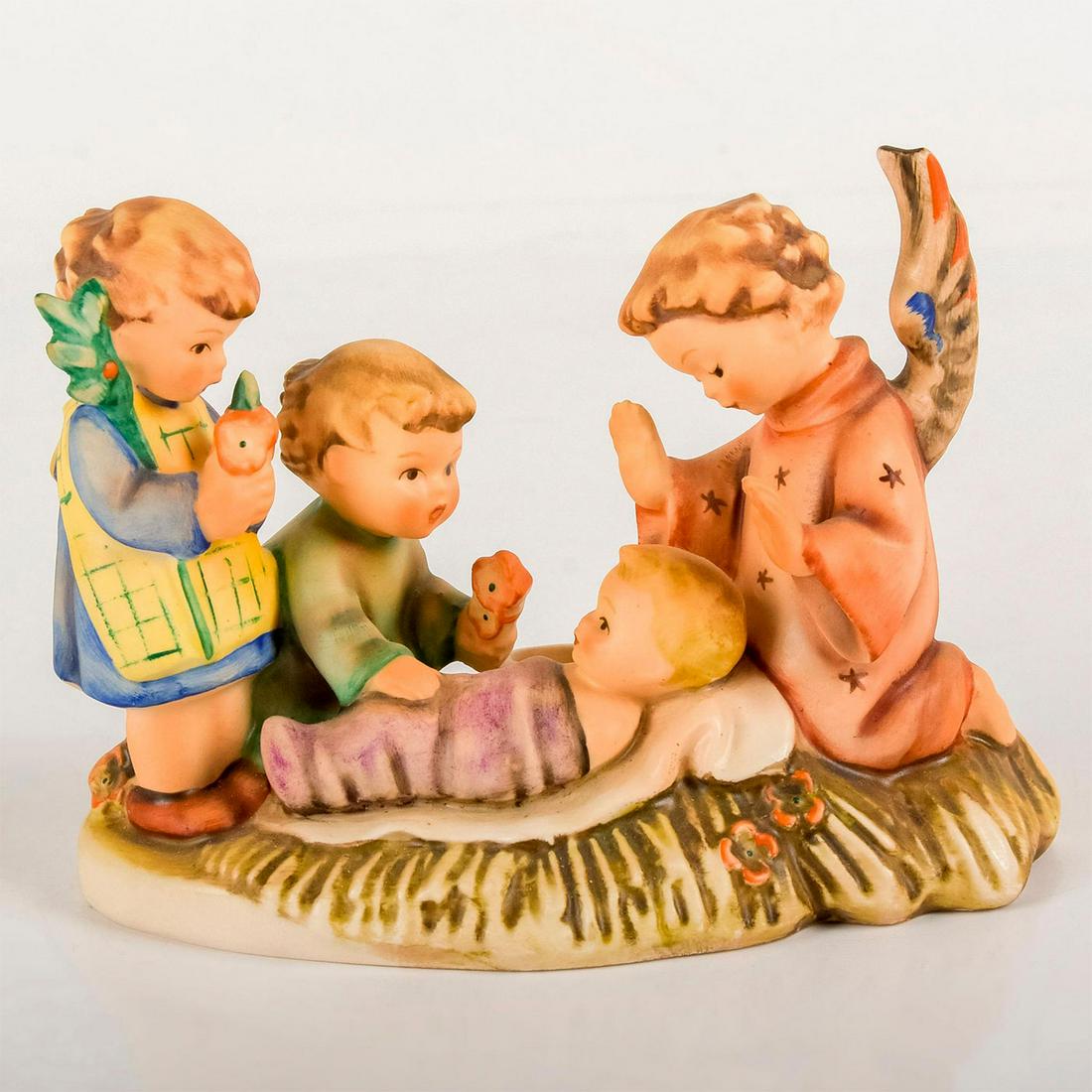Silent Night 54 - Hummel Figural Candleholder: Matte porcelain, hand painted. Lovely depiction of Christ's birth with children and angels. 'M. I. Hummel' inscribed on base. Goebel backstamp. Good condition. Candle not included. #goebel