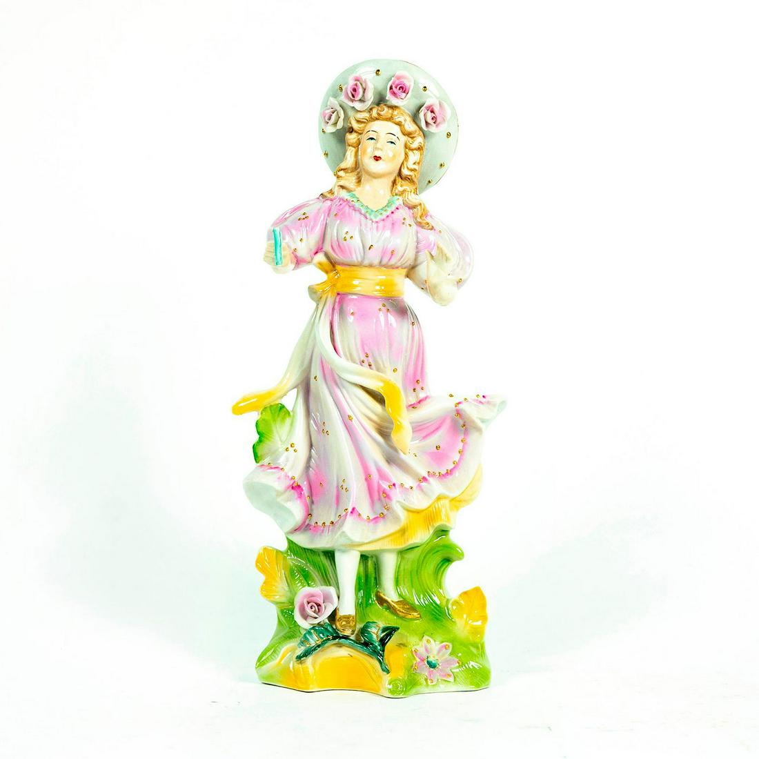 Vintage Japanese Porcelain Lady Figurine: Glazed porcelain figure modelled as woman in country scene. Pink and green coloration; gilt accents. Marked Made In Japan. Chipped petals. Dimensions: 14.75"H Issued: 20th c. Country of Origin: Japan