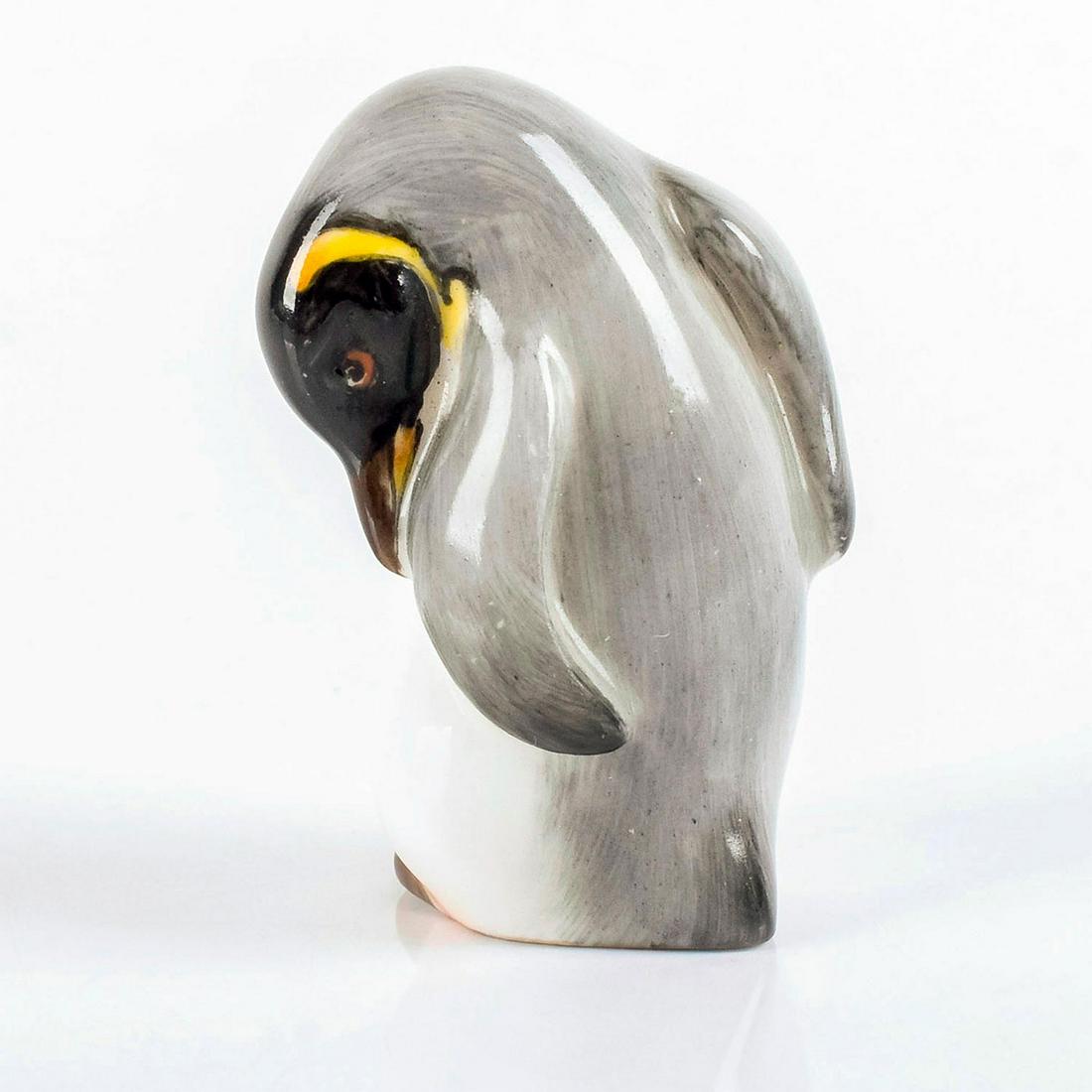 Royal Doulton Animal Figurine, Penguin K22: Bone China. Model 1098. Style Five, miniature penguin with it's head under wing. Royal Doulton backstamp. #royaldoulton #penguin #animal Artist: Peggy Davies Issued: 1940 - 1968 Dimensions: 1.75"H