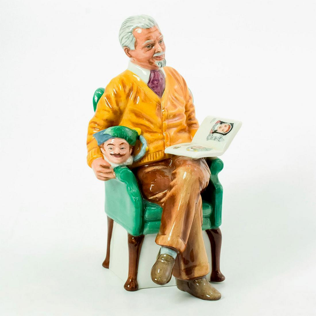 Pride and Joy HN2945 - Royal Doulton Figurine: Glossy porcelain, modeled as a Royal Doulton collector. Royal Doulton backstamp. Artist: Robert Tabbenor Issued: 1984 - 1984 Dimensions: 7"H Manufacturer: Royal Doulton Country of Origin: England