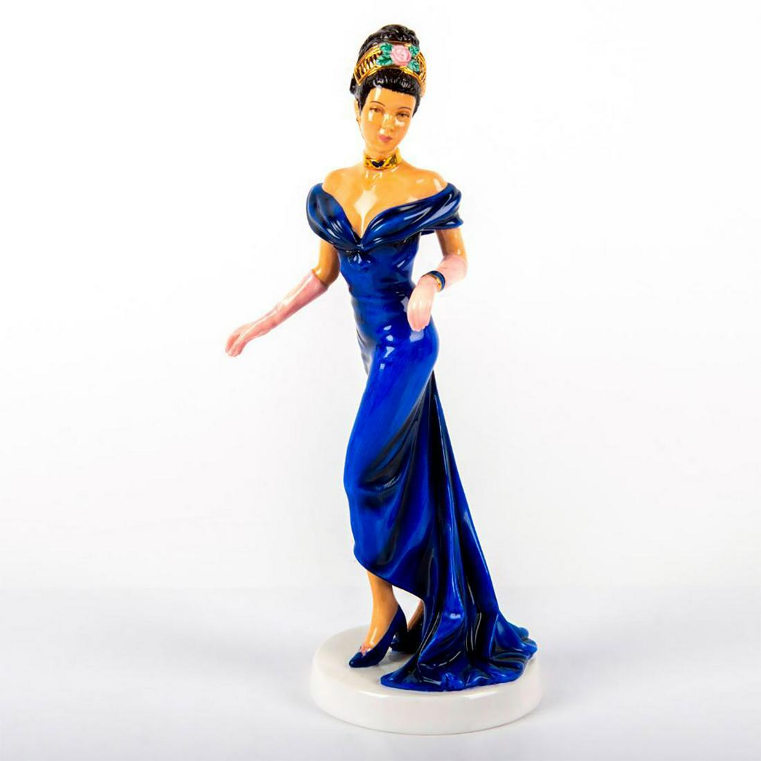 Royal Doulton Figurine, Naomi HN4995: Comes in original box. Cobalt blue dress. Royal Doulton backstamp. Good condition. Artist: Tim Potts Issued: 2007 - 2008 Dimensions: 8.75"H Manufacturer: Royal Doulton Country of Origin: England