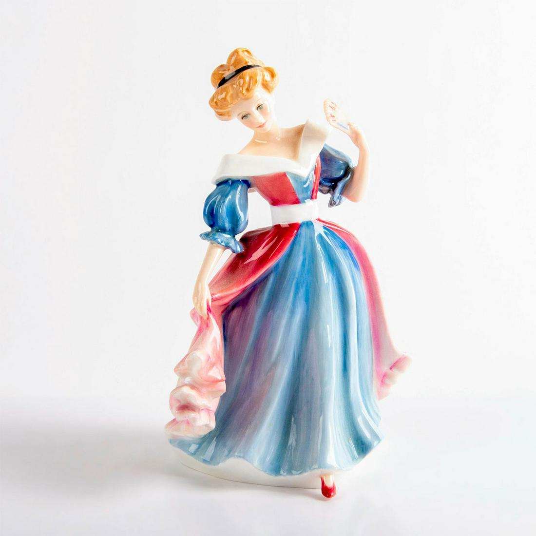 Amy HN3316 - Royal Doulton Figurine: Lady in blue and red dress. Figure of the year 1991. Royal Doulton backstamp. Artist: Peter Gee Issued: 1991 Dimensions: 8"H Manufacturer: Royal Doulton Country of Origin: England