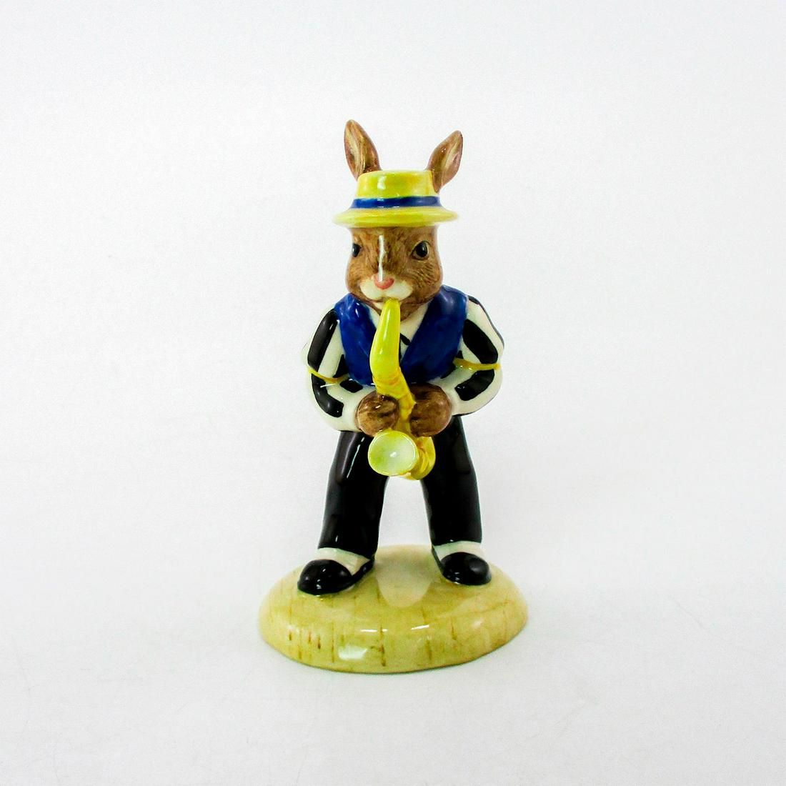 Saxaphone DB186 - Royal Doulton Bunnykins: Navy and white striped shirt, navy vest, black trouser, yellow straw hat. Royal Doulton backstamp. From the Jazz Band Collection. Certificate of Authenticity included. Produced exclusively for UK Inte