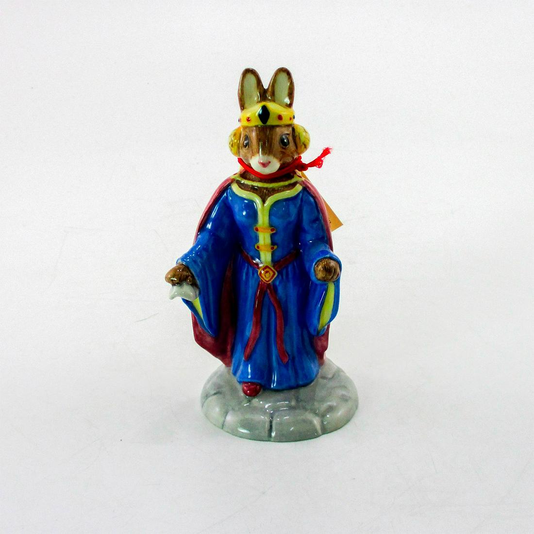 Queen Guinevere DB302 - Royal Doulton Bunnykins: Royal blue, red, yellow, cream, and grey. Bunnykins backstamp. Certificate included. From the Arthurian Legend Collection. Artist: C. Dadd Issued: 2004 Dimensions: 4.25"H Manufacturer: Royal Doulton C