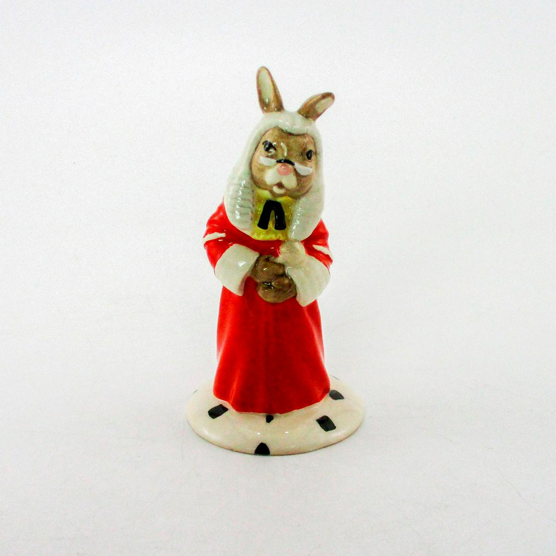 Judge DB188 - Royal Doulton Bunnykins: White, black and yellow coloration. Exclusively for Collectors Club. Royal Doulton backstamp. Artist: C. Dadd Issued: 1999 - 1999 Dimensions: 4.25"H Manufacturer: Royal Doulton Country of Origin: Engl