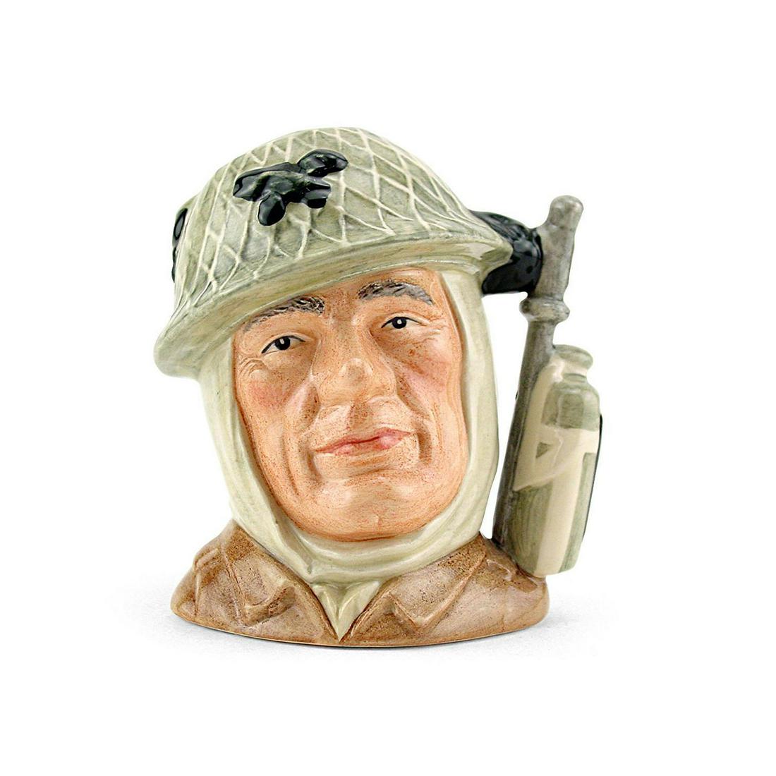 Soldier D6876 - Small - Royal Doulton Character Jug: Soldier D6876 (Army steel helmet with netting; khaki tunic). Designed by William K. Harper. Series: The Armed Forces, issued 1991 - 1996. Size: 4.5"H (small) Manufacturer: Royal Doulton Country of