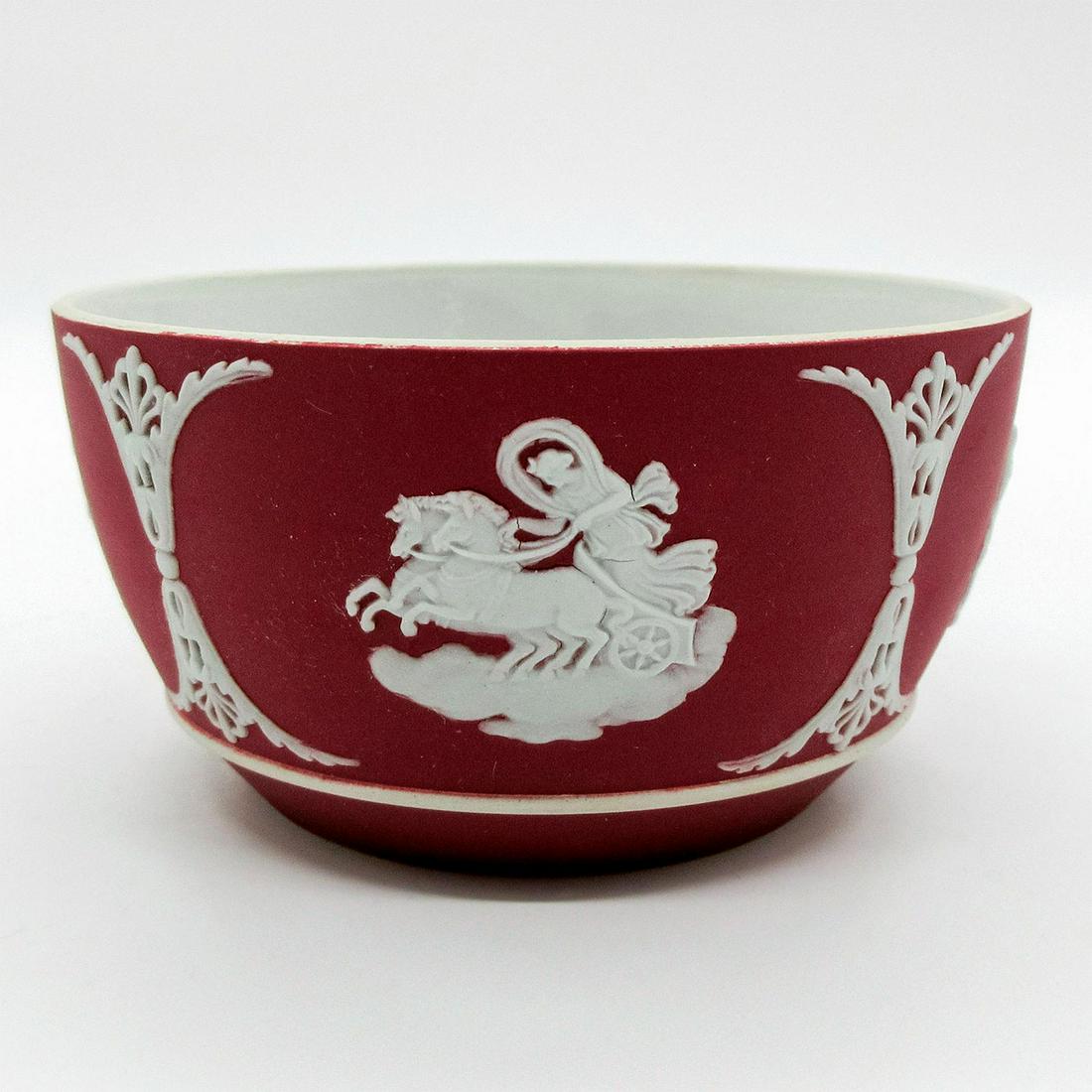 Wedgwood Crimson Red Jasperware, Dip Bowl: Rare crimson red jasperware dip bowl. White neoclassical design sprigged decoration. Wedgwood impressed on the bottom. Weight - 7.6 oz. Age related wares. Minor chip on the sprigged decoration. Overal