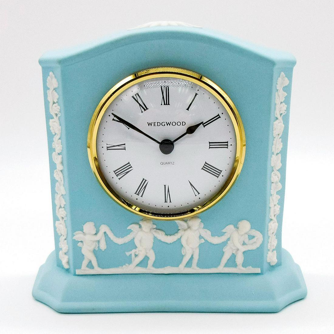 Wedgwood Dark Turquoise Jasperware, Cupids Clock: Dark turquoise Jasperware clock with Neoclassical cupid pattern in white relief. Impressed Wedgwood backstamp. Clock untested. Minor scratches to clock face. #wedgwood #jasperware Issued: 2007 - 2014 
